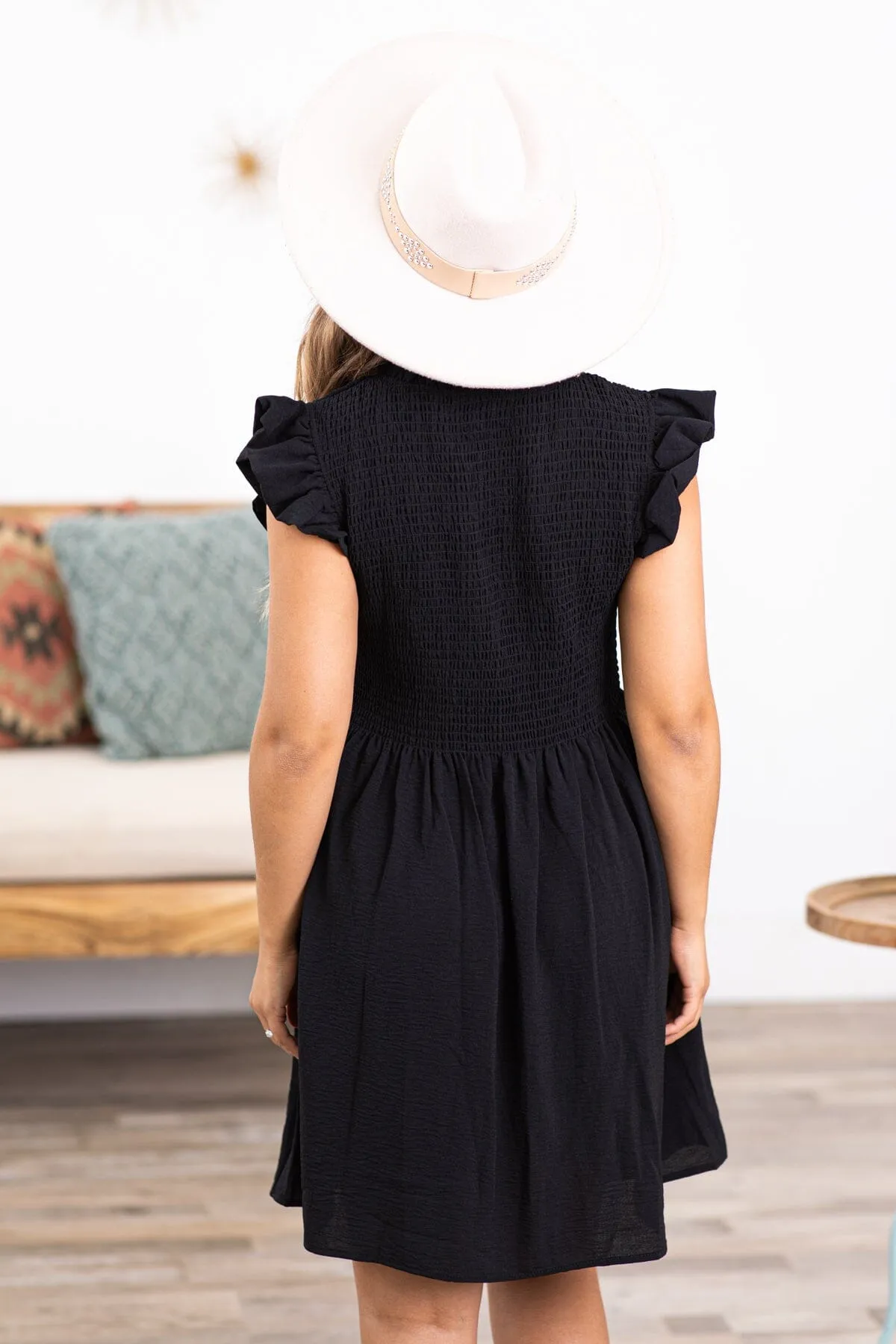 Black Flutter Sleeve Smocked Bodice Dress