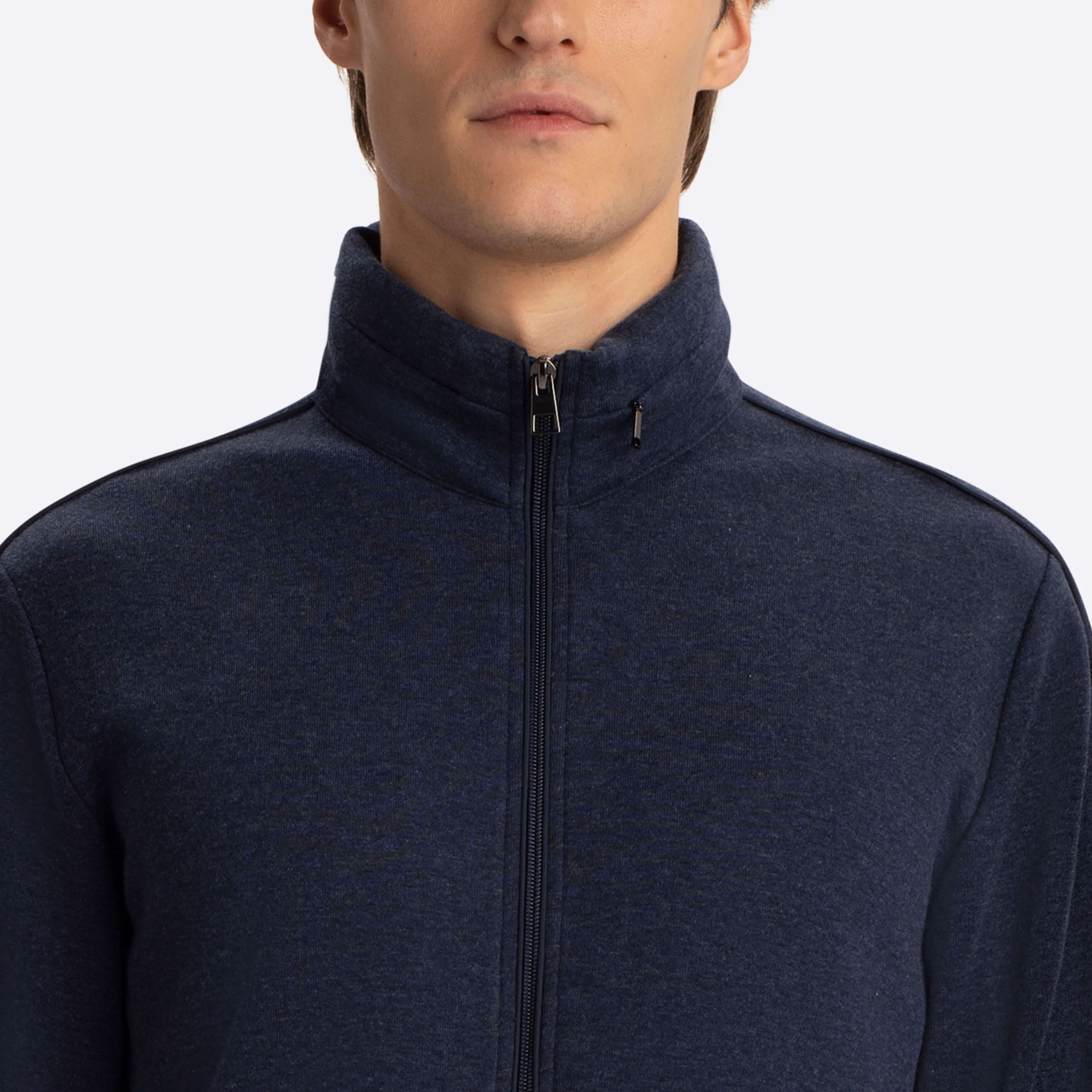Full Zip Mock Neck Sweatshirt with Stow-Away Hood.